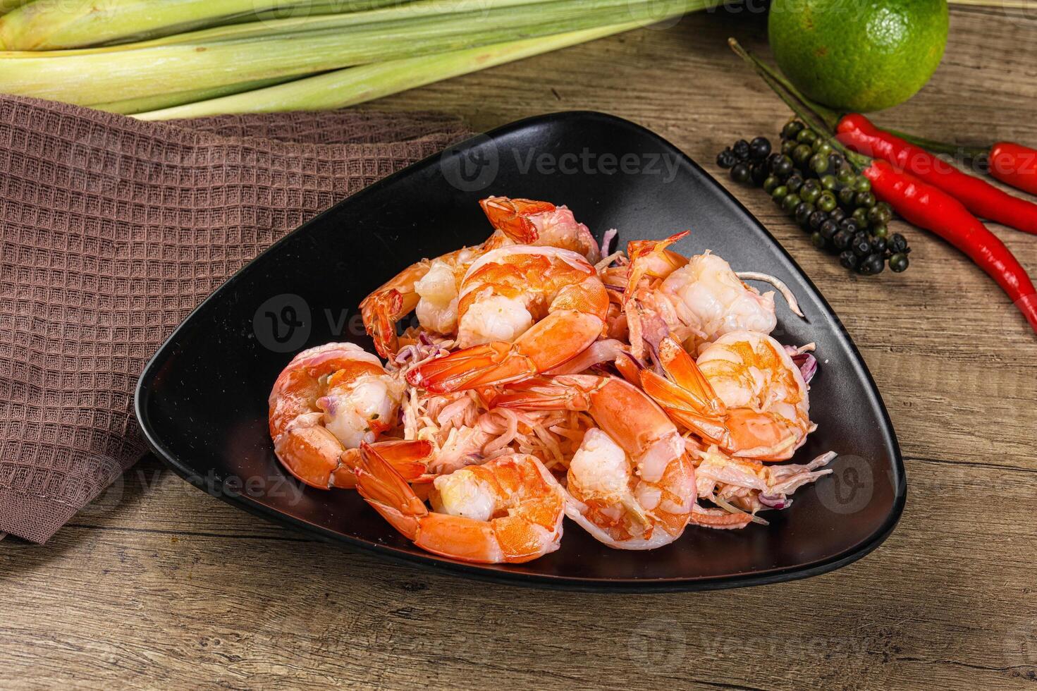 Shrimp cocktail with salad and sauce photo