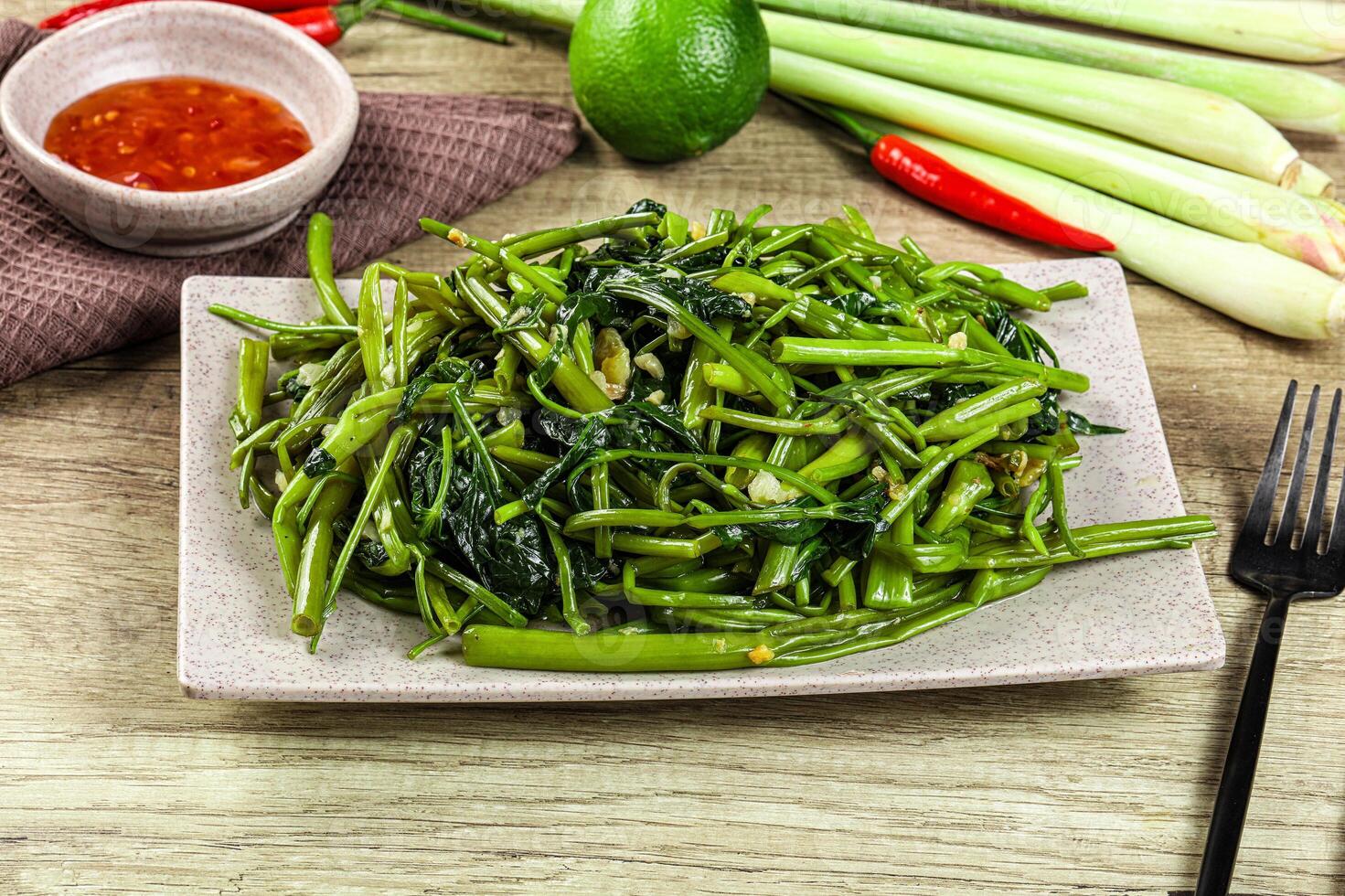 Asian cuisine stir fried morning glory photo