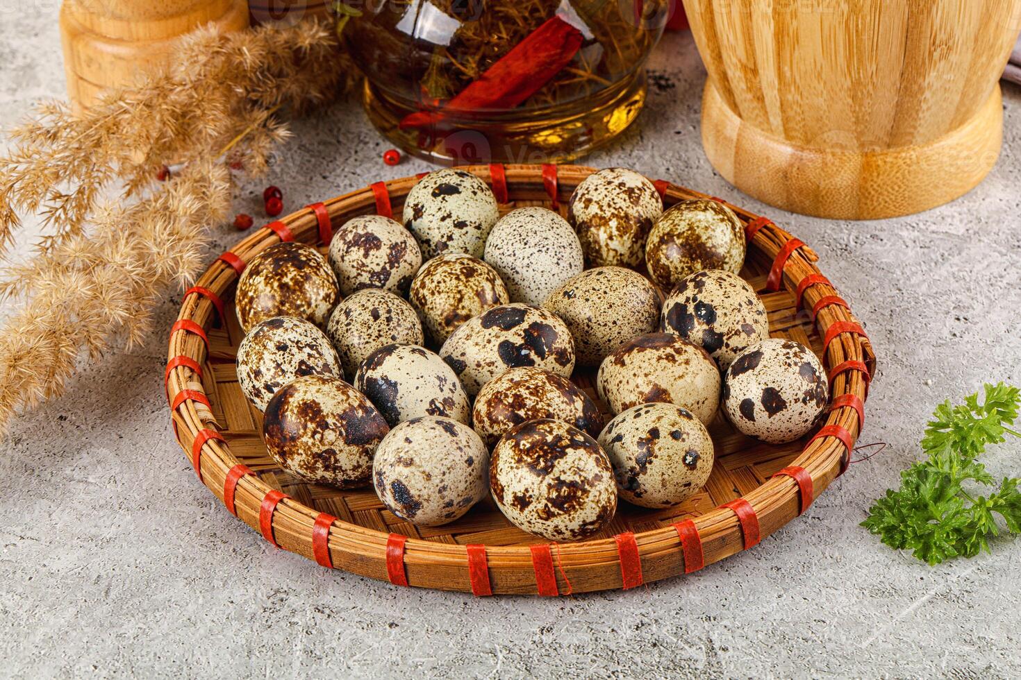 Raw quail egg in the bowl photo