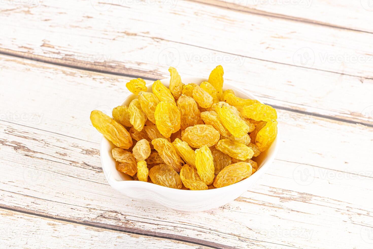 Yellow raisin - dry grape berries photo
