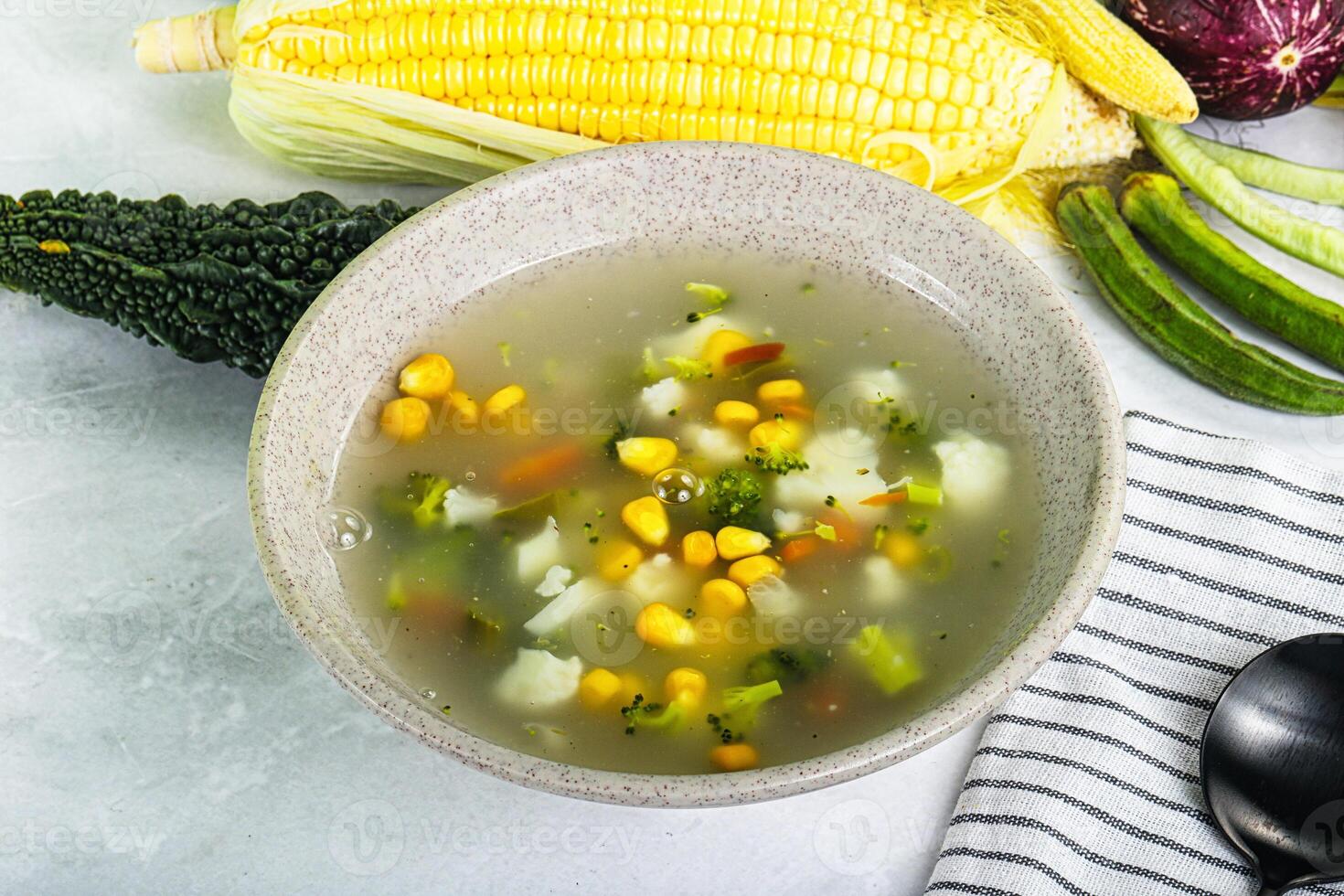 Soup with corn and broccoli photo