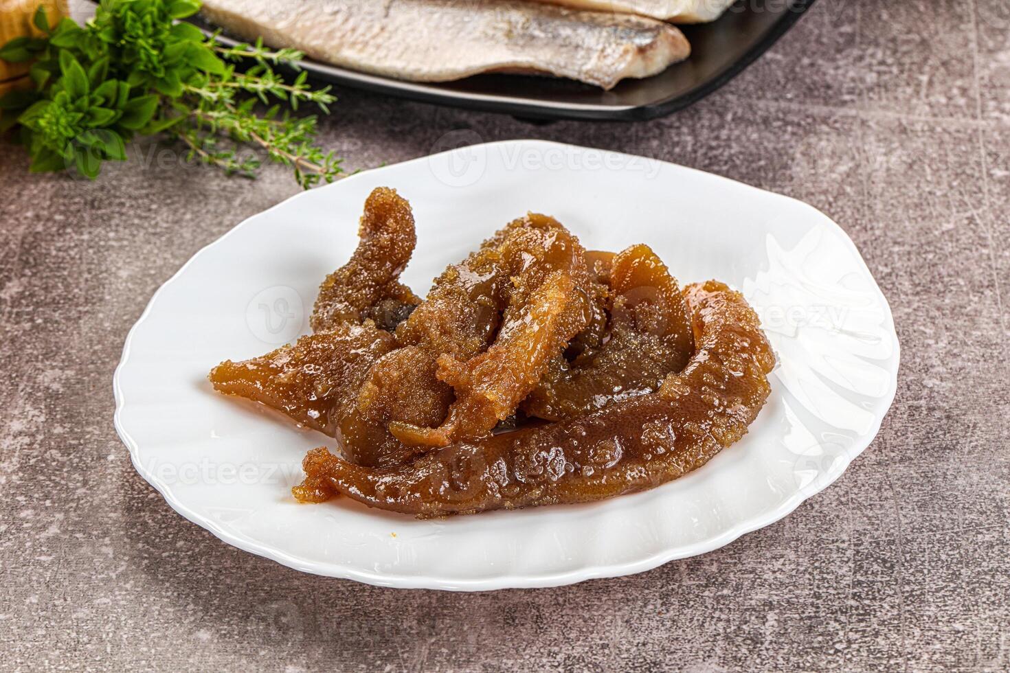 Herring roe snack in the plate photo