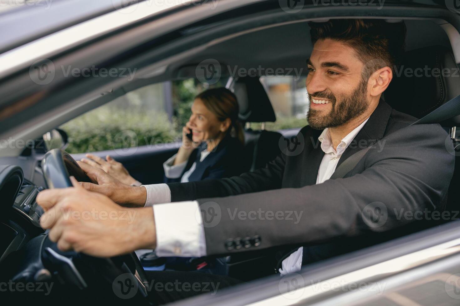 Cheerful couple of business colleagues going on a business trip together and having some fun photo