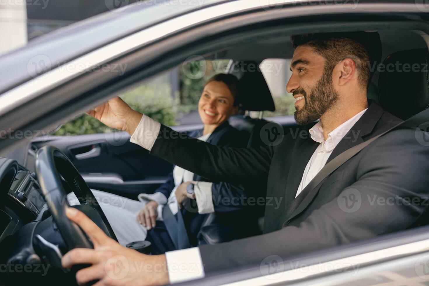 Cheerful couple of business colleagues going on a business trip together and having some fun photo