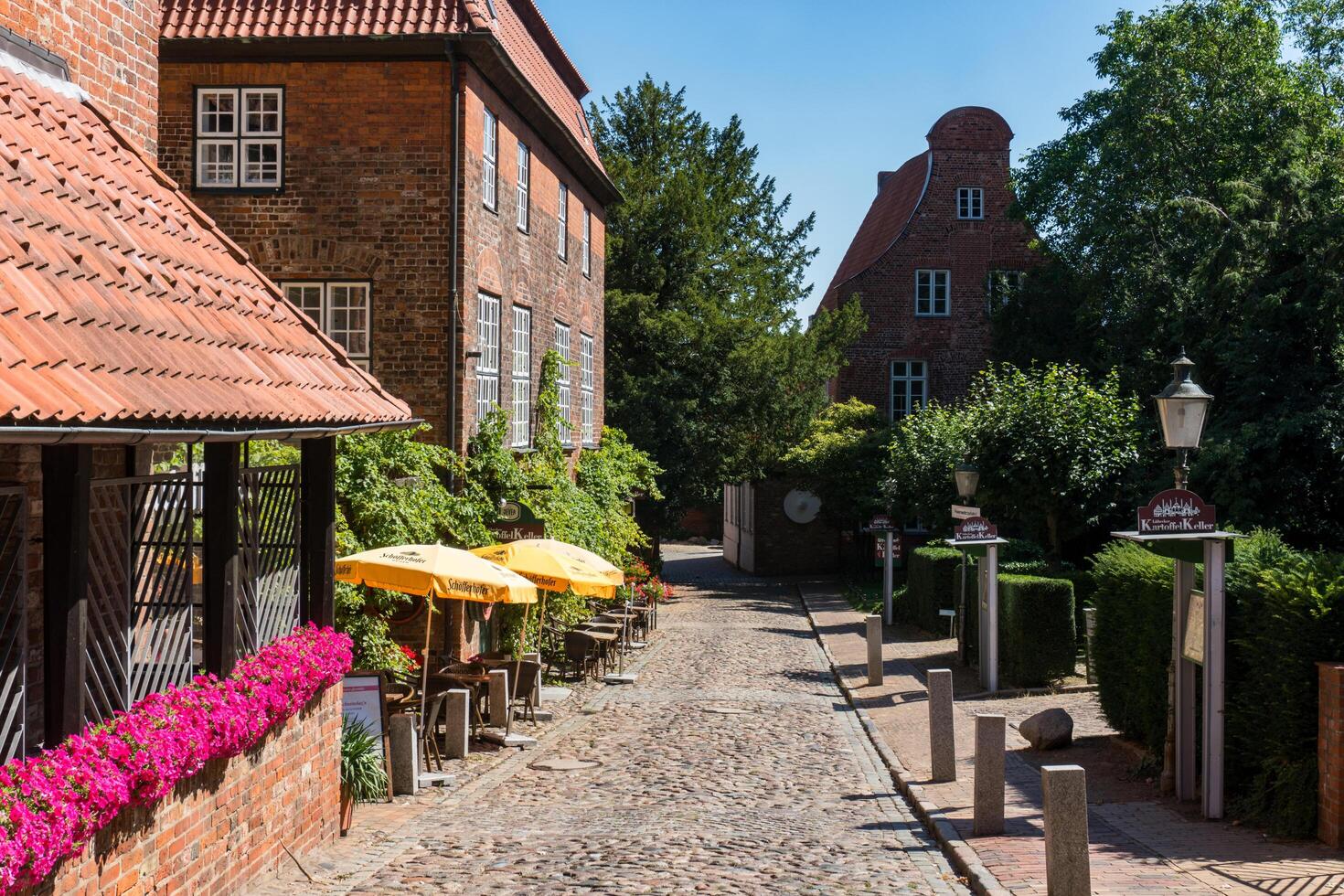 Lubeck, Germany-august 12, 2022-Walking through the streets of Lubeck during a sunny day photo