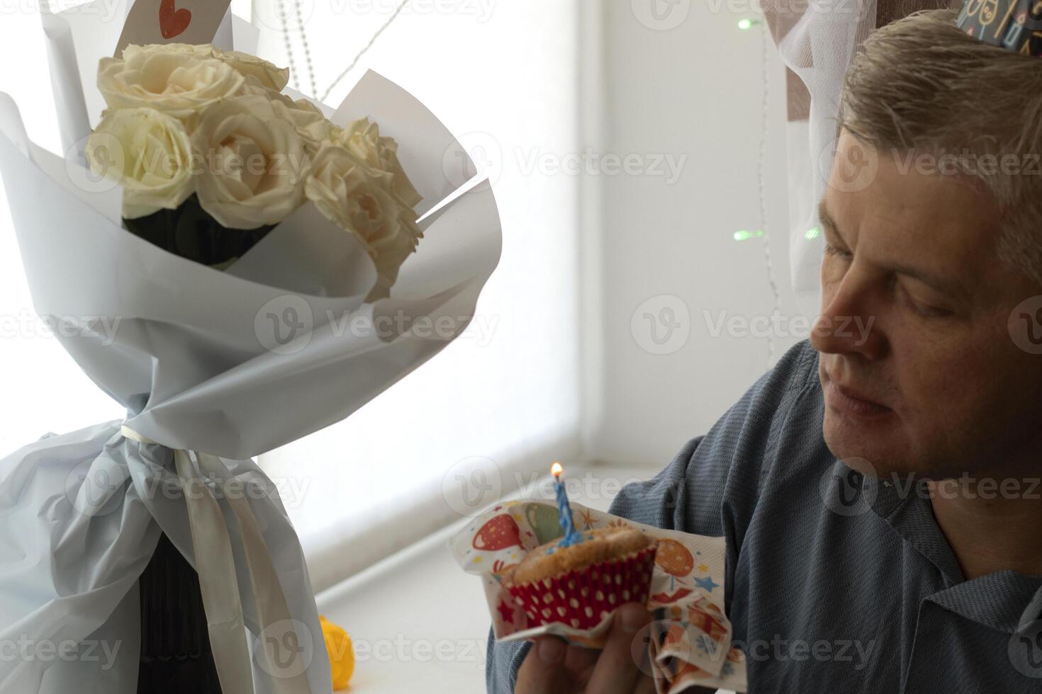 Mid aged man celebrating alone. People photo