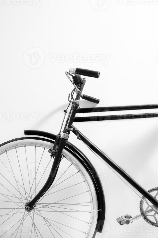 a black and white photo of a bicycle