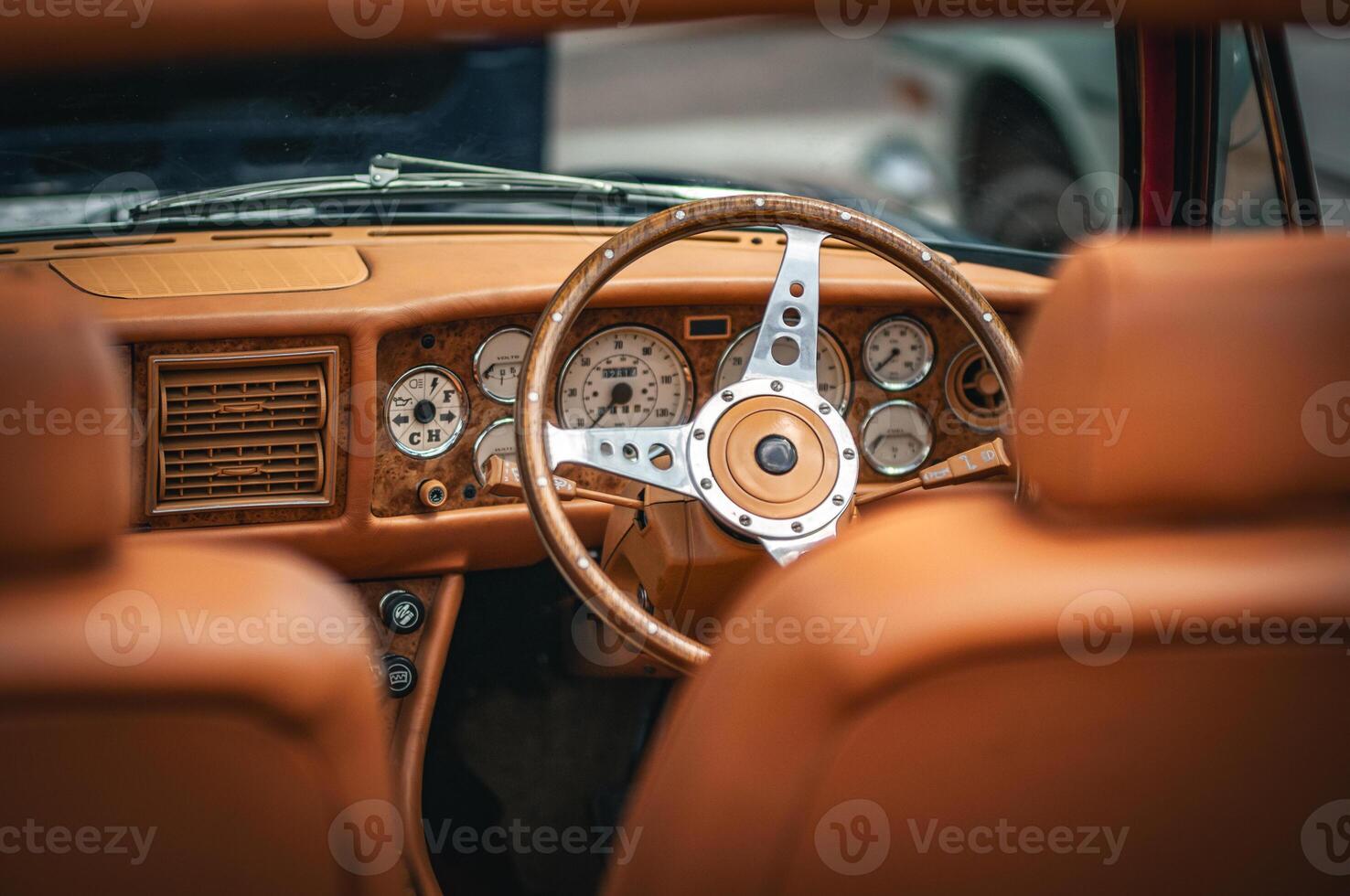 Interior of a luxury, classic car on a motor show. photo