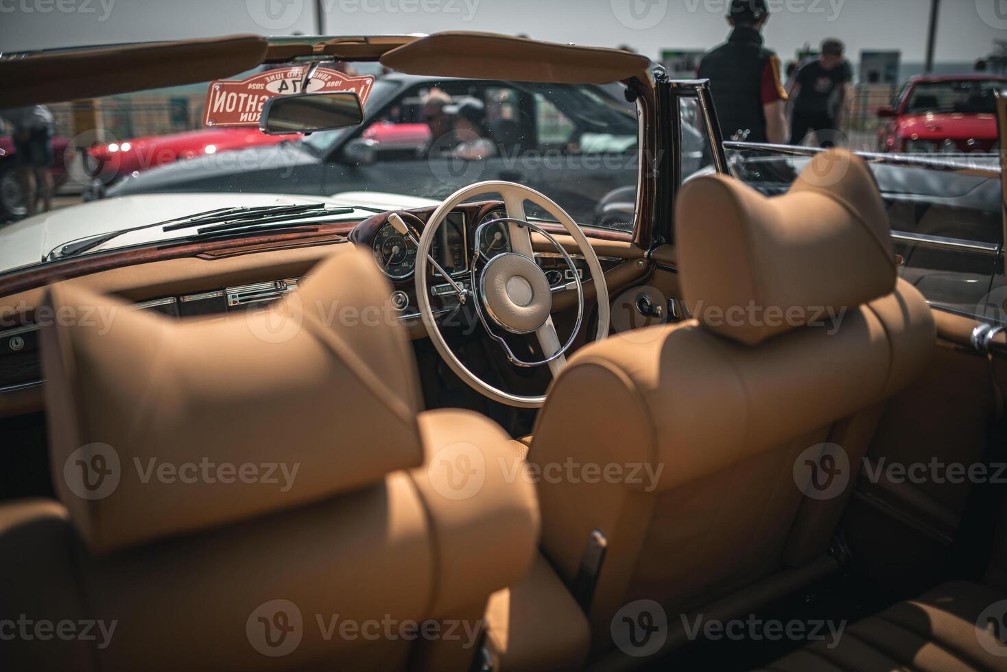 Interior of a luxury, classic car on a motor show. photo