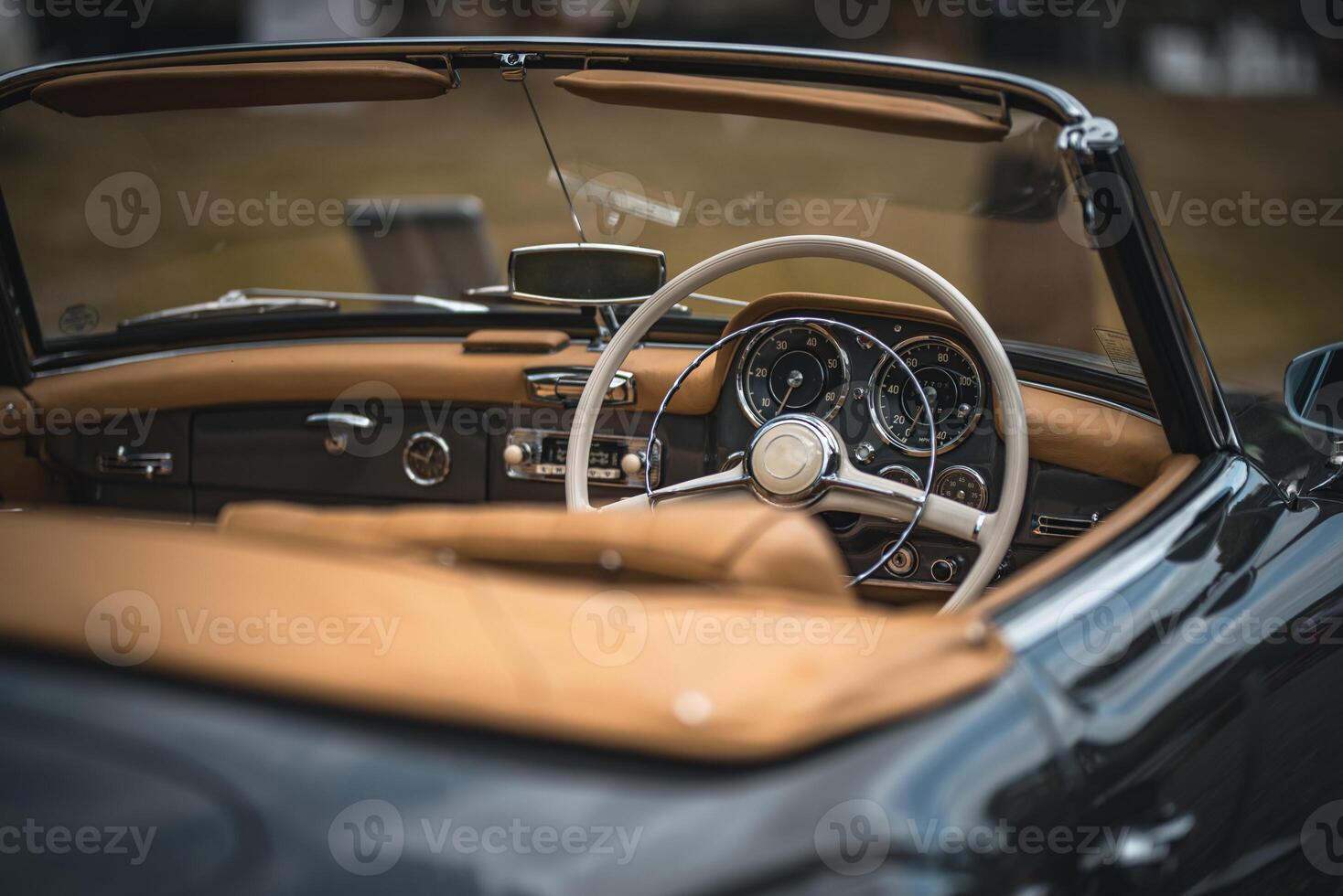 Interior of a luxury, classic car on a motor show. photo