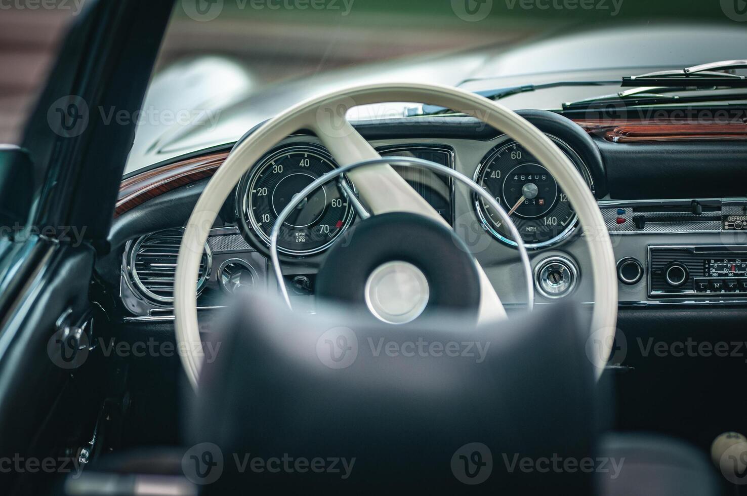 Interior of a luxury, classic car on a motor show. photo