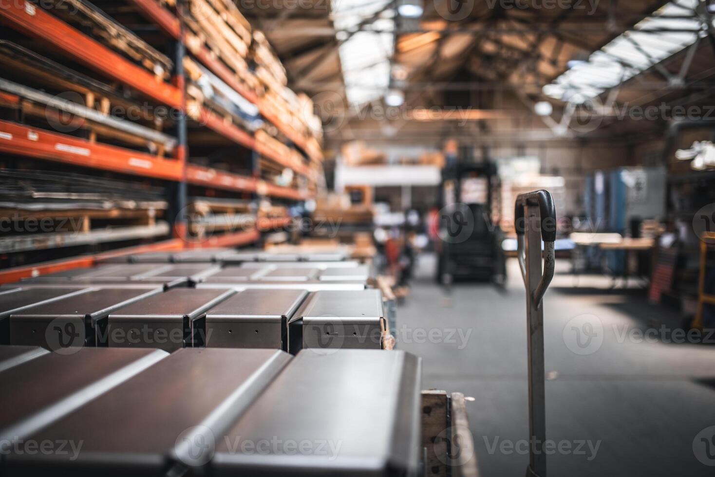Finished product on a palets and raw material on shelves in a factory. photo