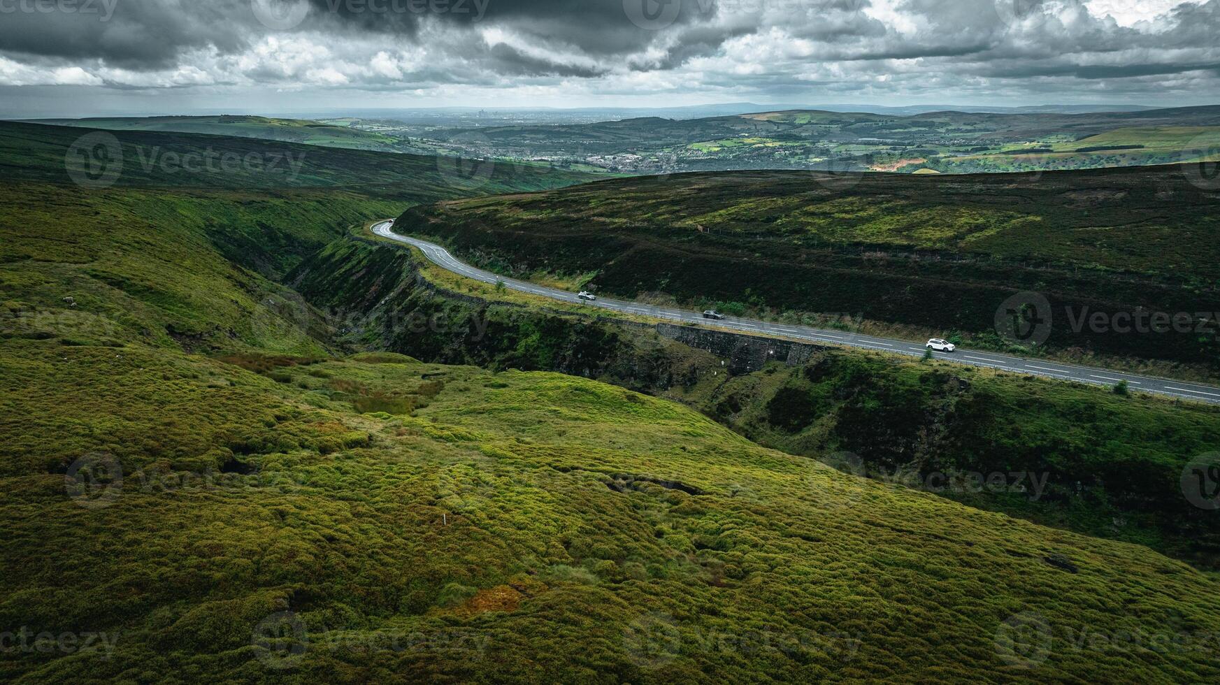 Aerial view of curvy windy roads on a moody summer day in Yorkshire, UK photo