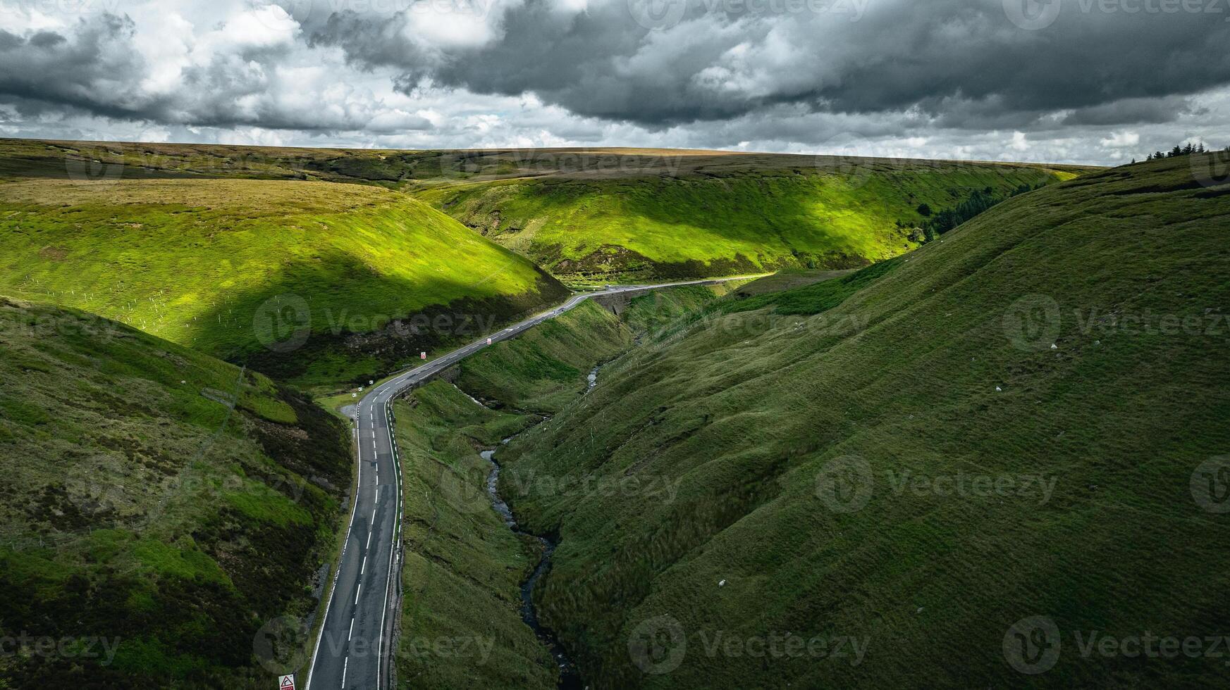 Aerial view of curvy windy roads on a moody summer day in Yorkshire, UK photo