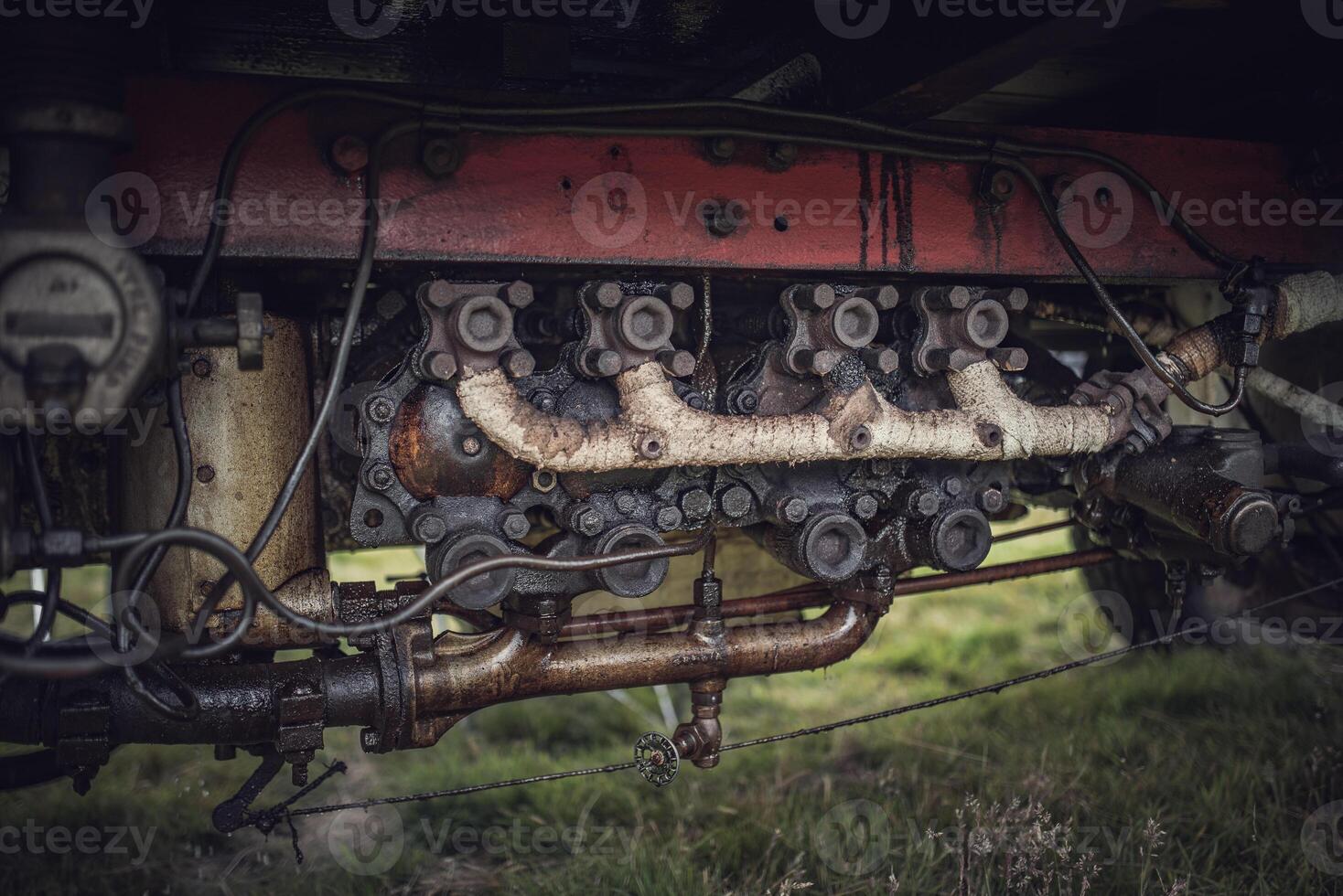 Old truck steam engine in a vintage classic steam tractor show. photo