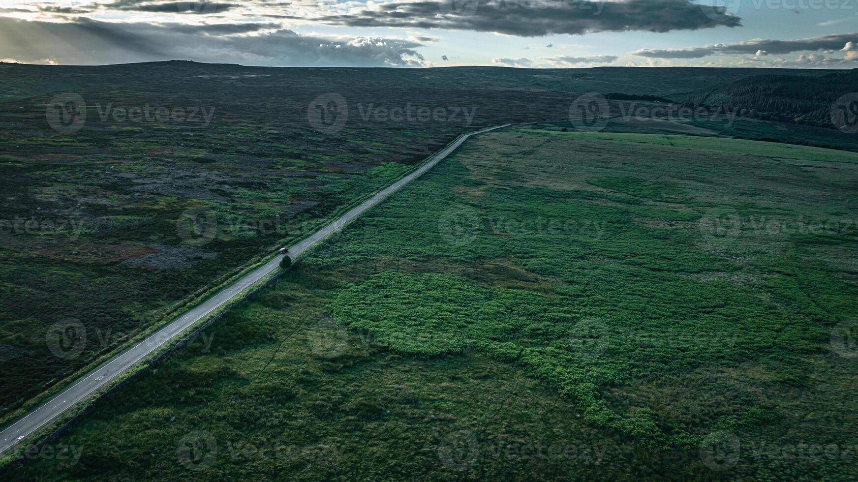 Aerial view of curvy windy roads on a moody summer day in Yorkshire, UK photo