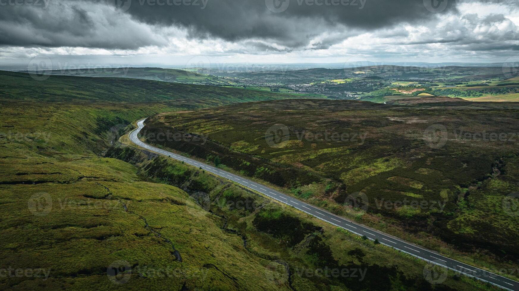 Aerial view of curvy windy roads on a moody summer day in Yorkshire, UK photo