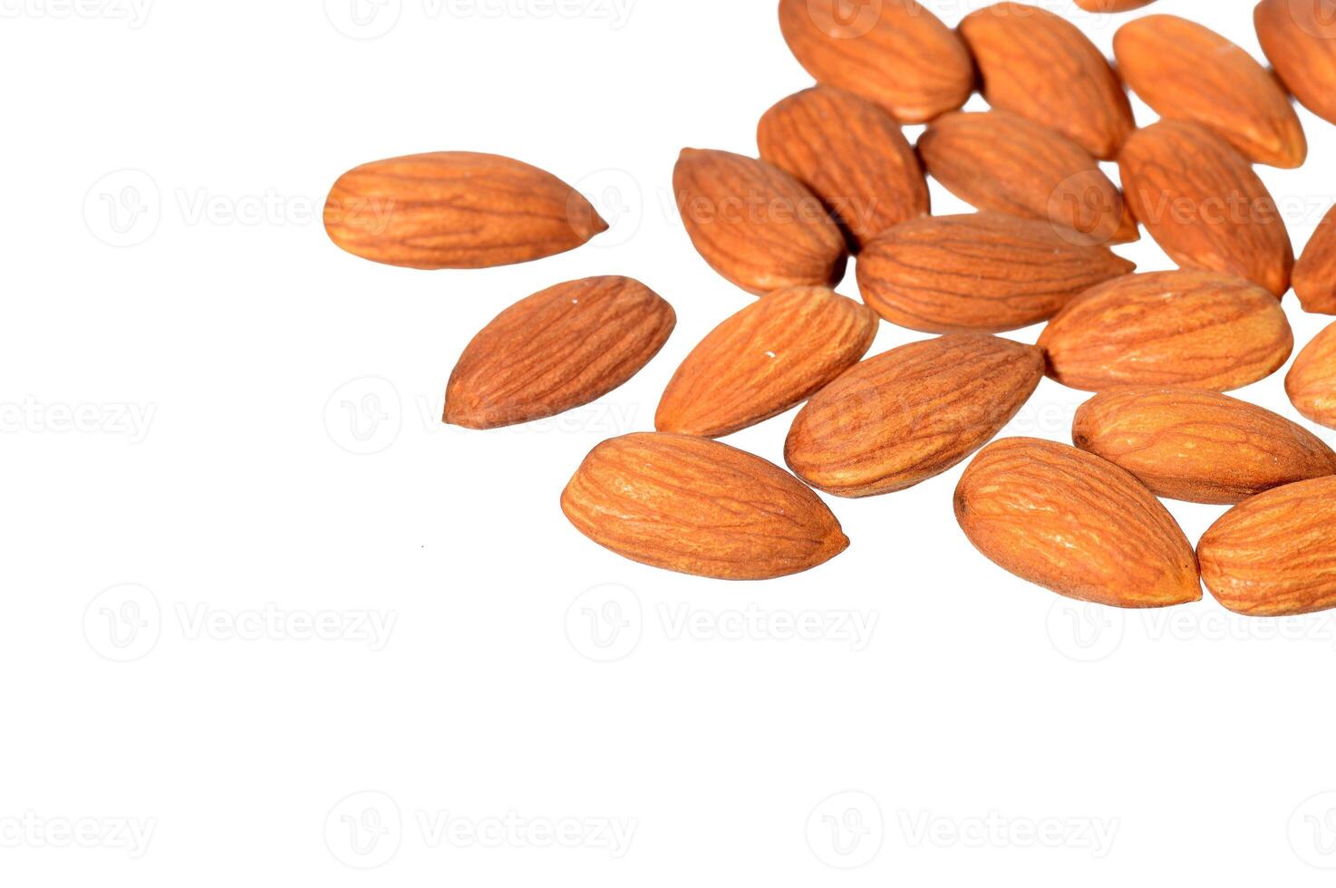 Tasty almonds nuts isolated on white background photo