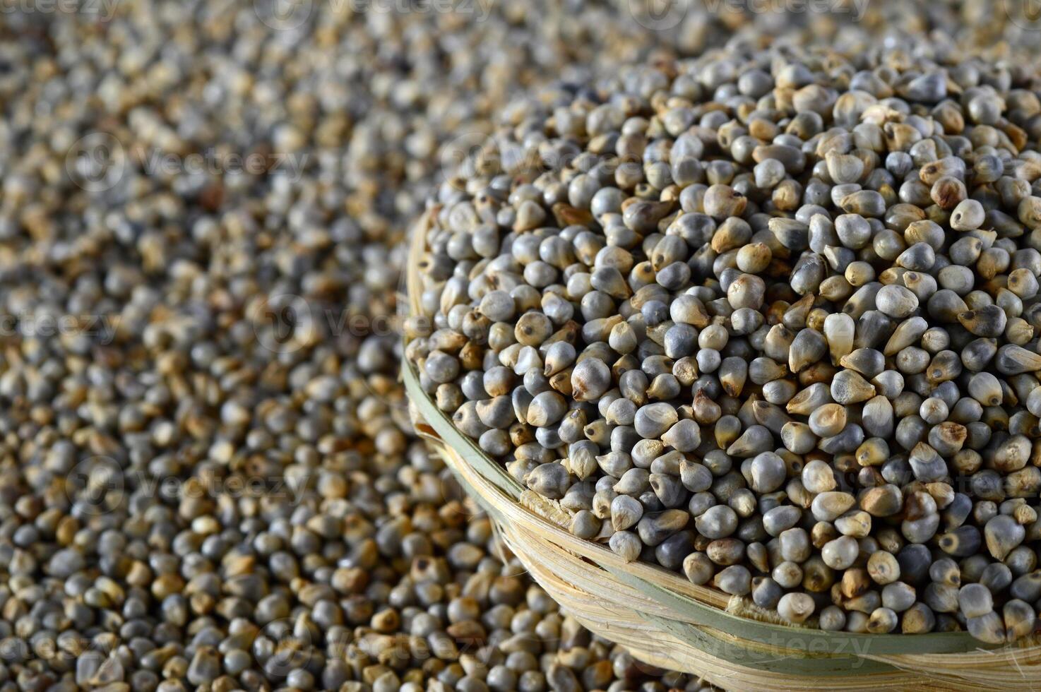 A basket full of seeds on a table photo