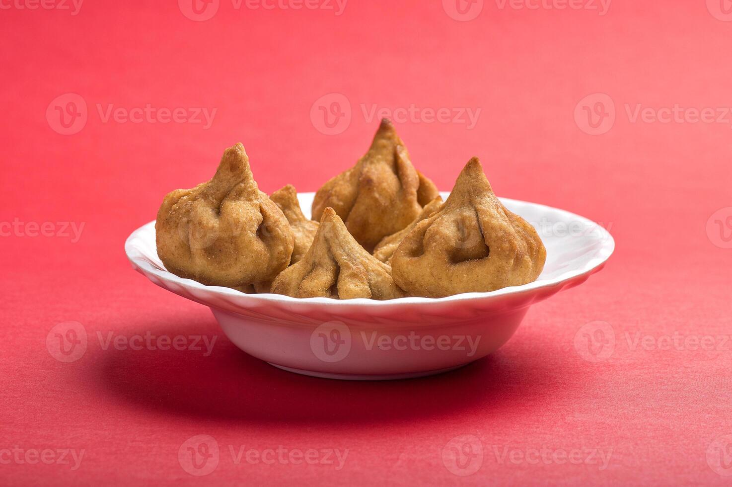 Indian Food Modak, Maharashtra Sweet Dish, favourite sweet of lord ganesha, greeting card design. Copy-space. photo