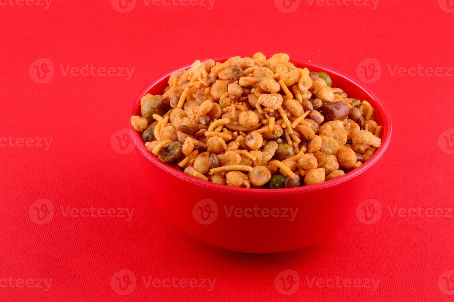 A bowl of food on a red background photo