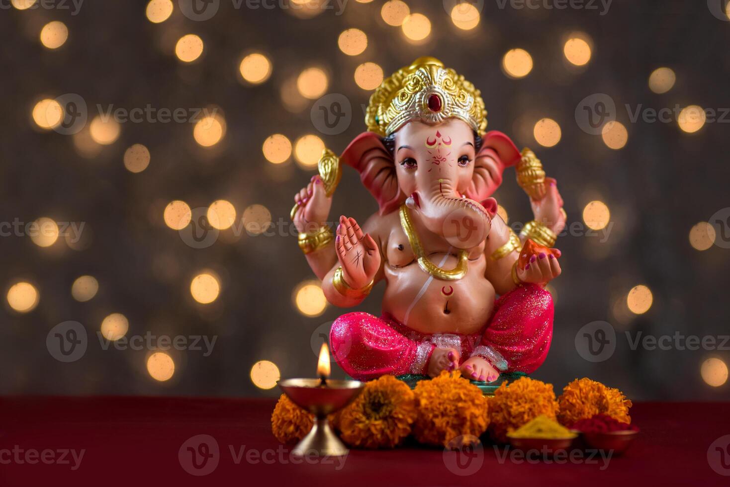 Hindu God Ganesha on Blured bokeh background, Ganesha Idol. photo