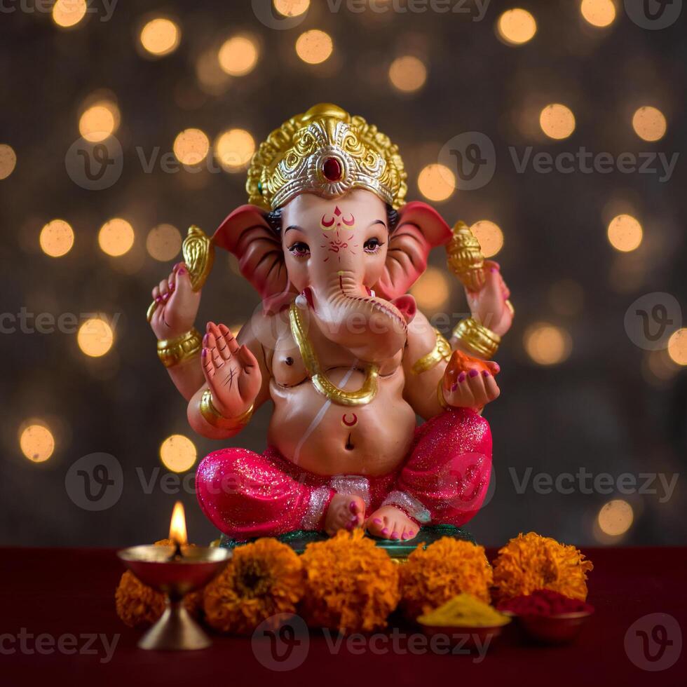 Hindu God Ganesha on Blured bokeh background, Ganesha Idol. photo