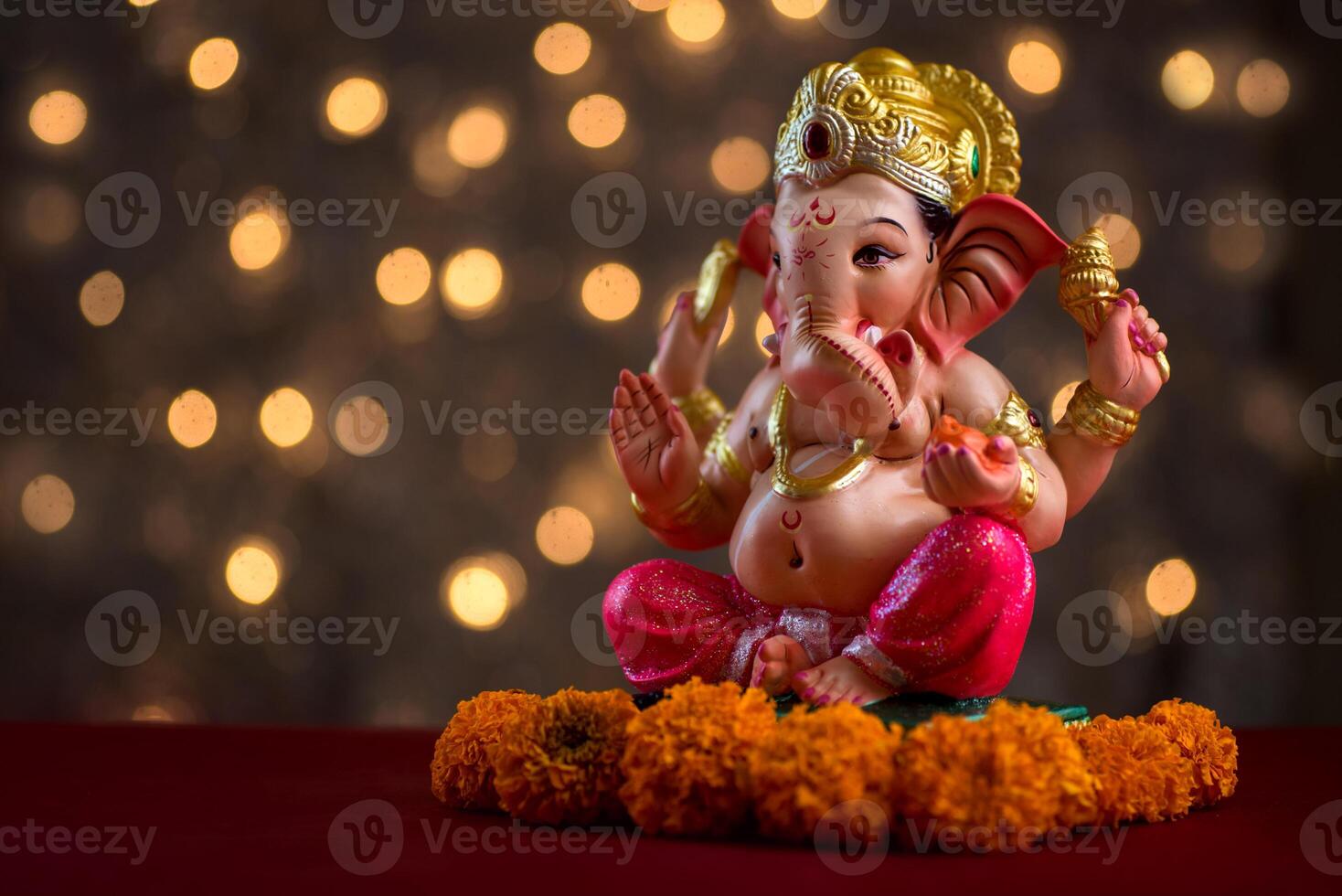 Hindu God Ganesha on Blured bokeh background, Ganesha Idol. photo
