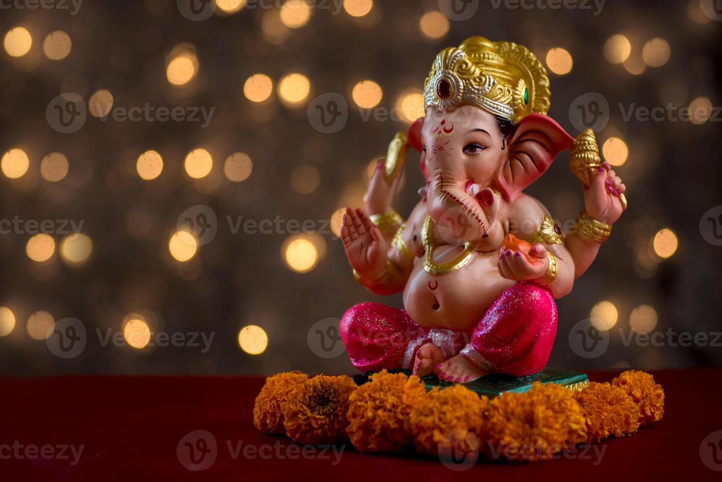 Hindu God Ganesha on Blured bokeh background, Ganesha Idol. photo