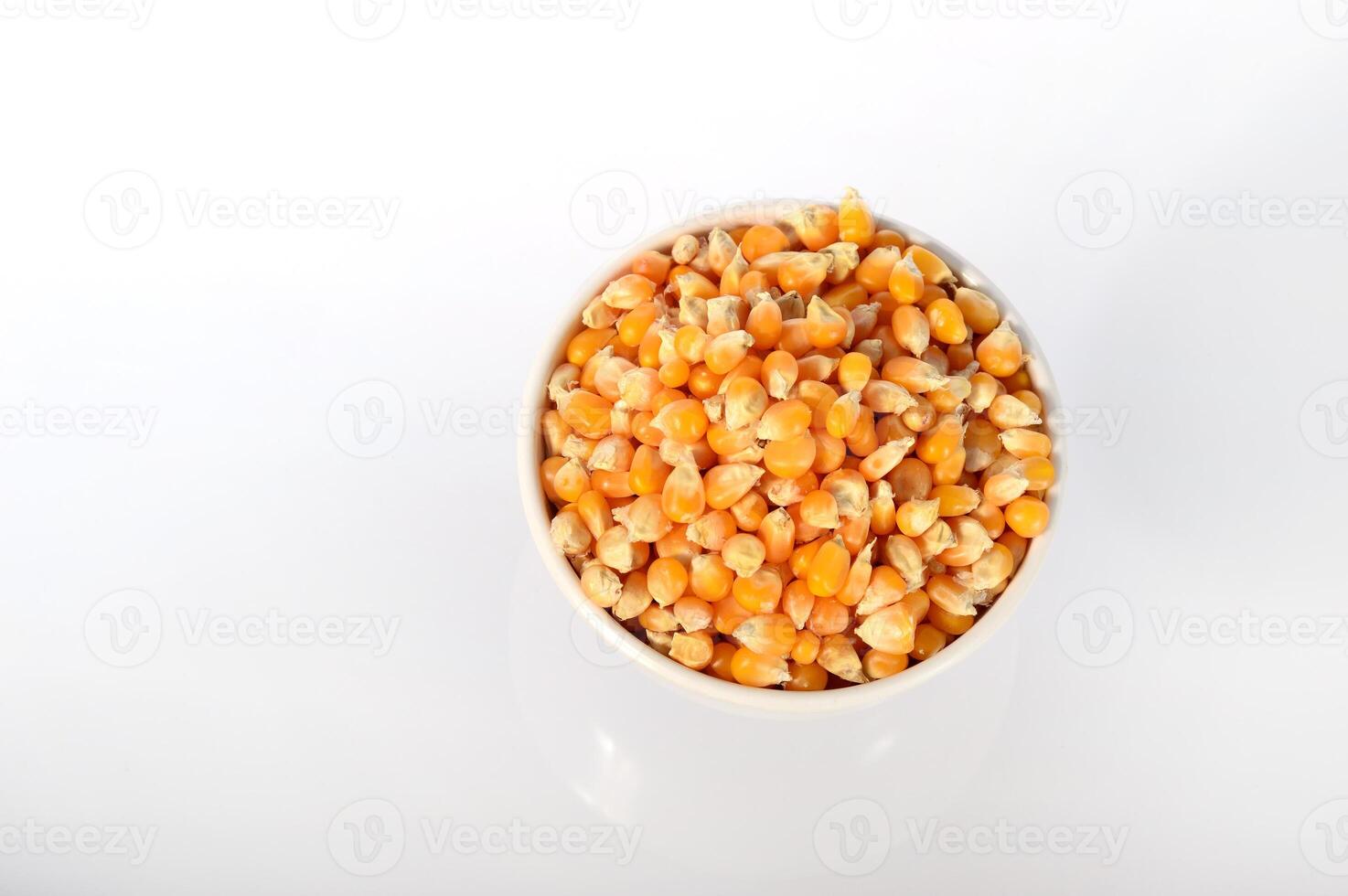 Close-up of Dried corn in clay pot photo