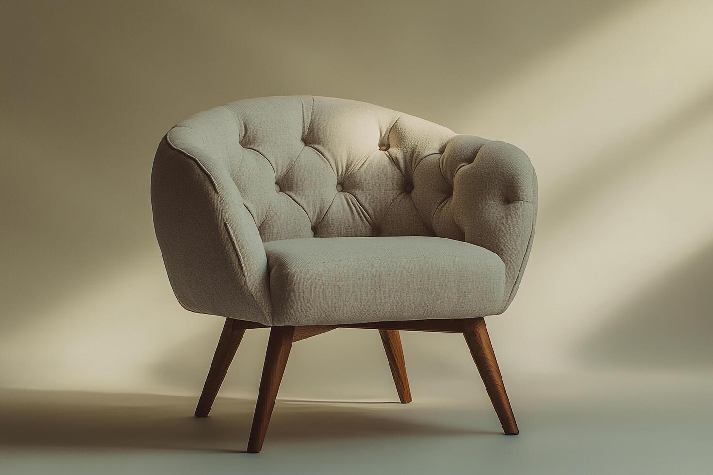 Chic modern chair with button tufts and angular wooden legs isolated photo