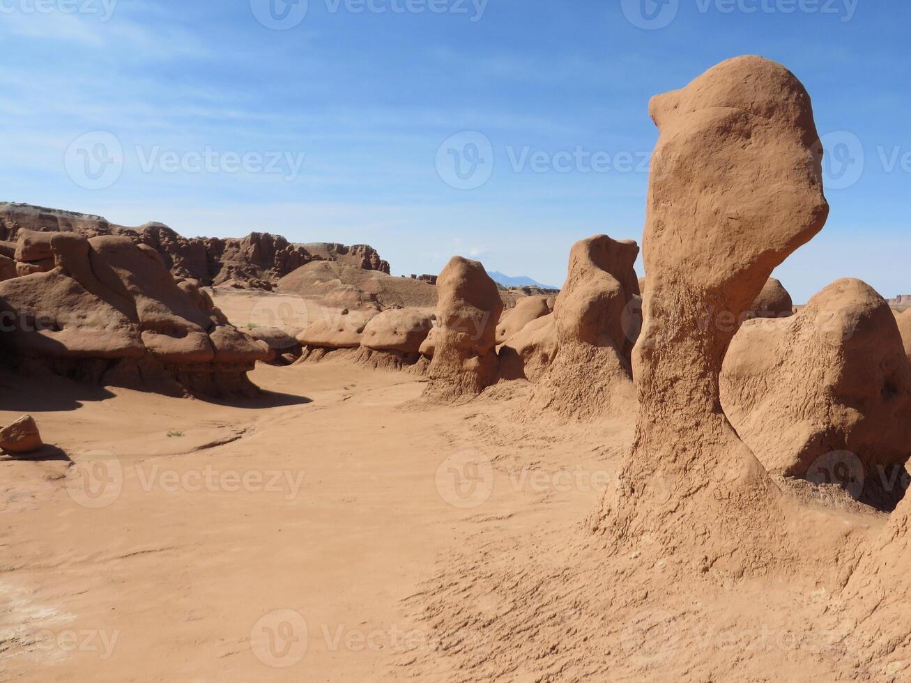 Dynamic Eroded Sandstone Rock Formations at Goblin Valley State Park, Utah, USA photo