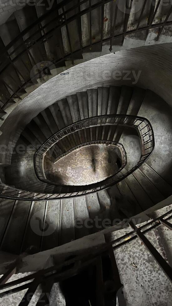 Spiral staircase inside the observation tower on the mountain in Jelenia Gora, Poland photo