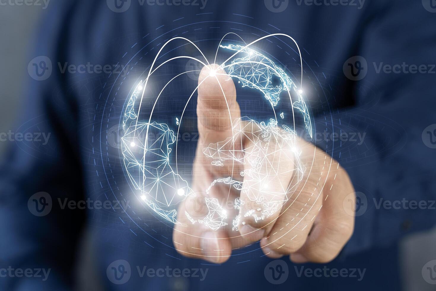 Hand pushing an earth button on the touch screen interface with the black background. photo