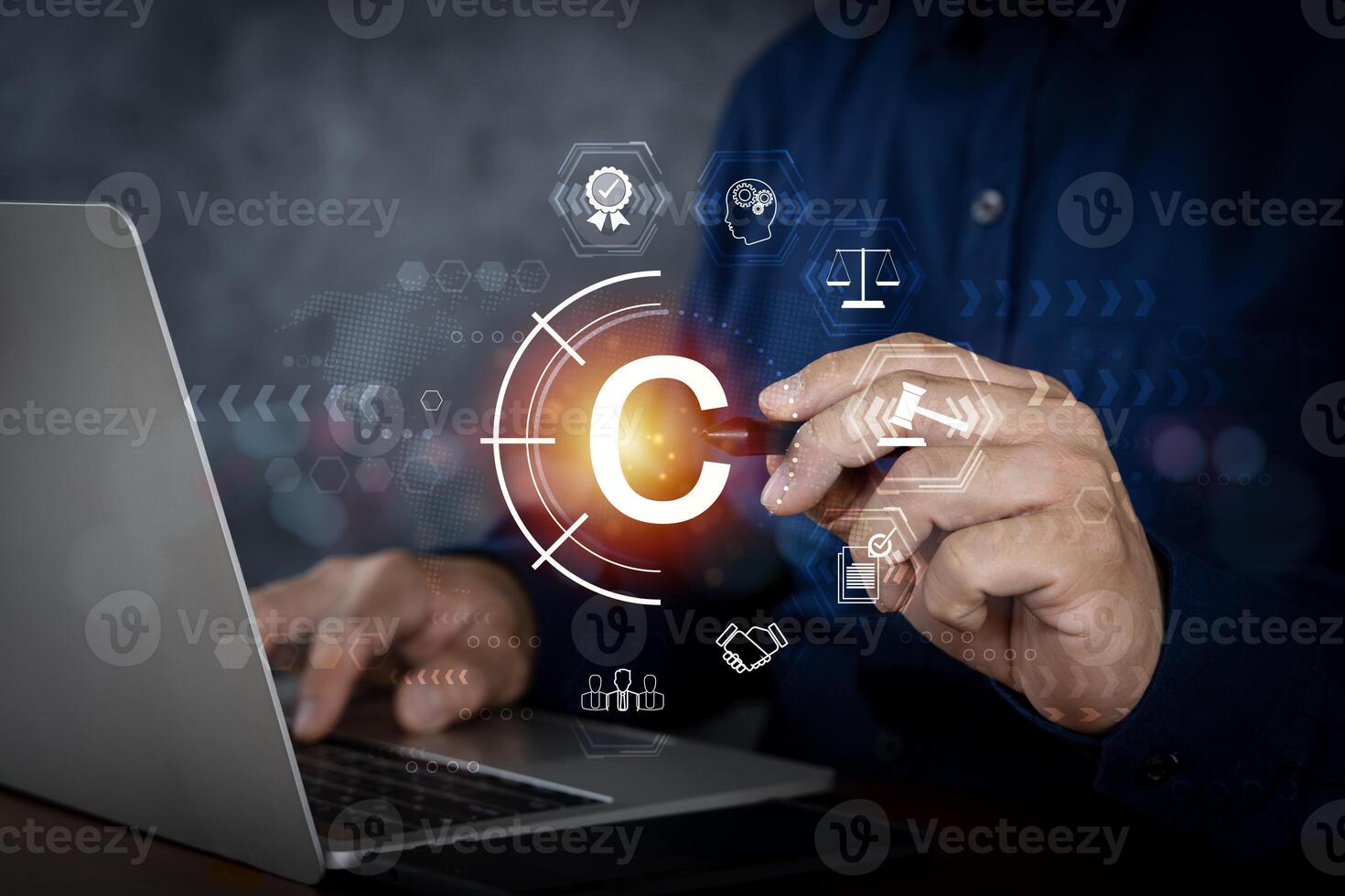 Copyright or patent concept, Person hand using laptop computer on desk with VR screen copyright icon background, Copyleft trademark license. photo