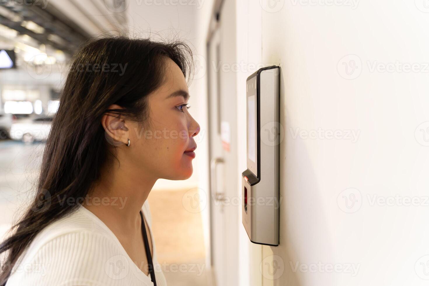 Futuristic and technological scanning of the face of a beautiful business woman for facial recognition can serve. photo
