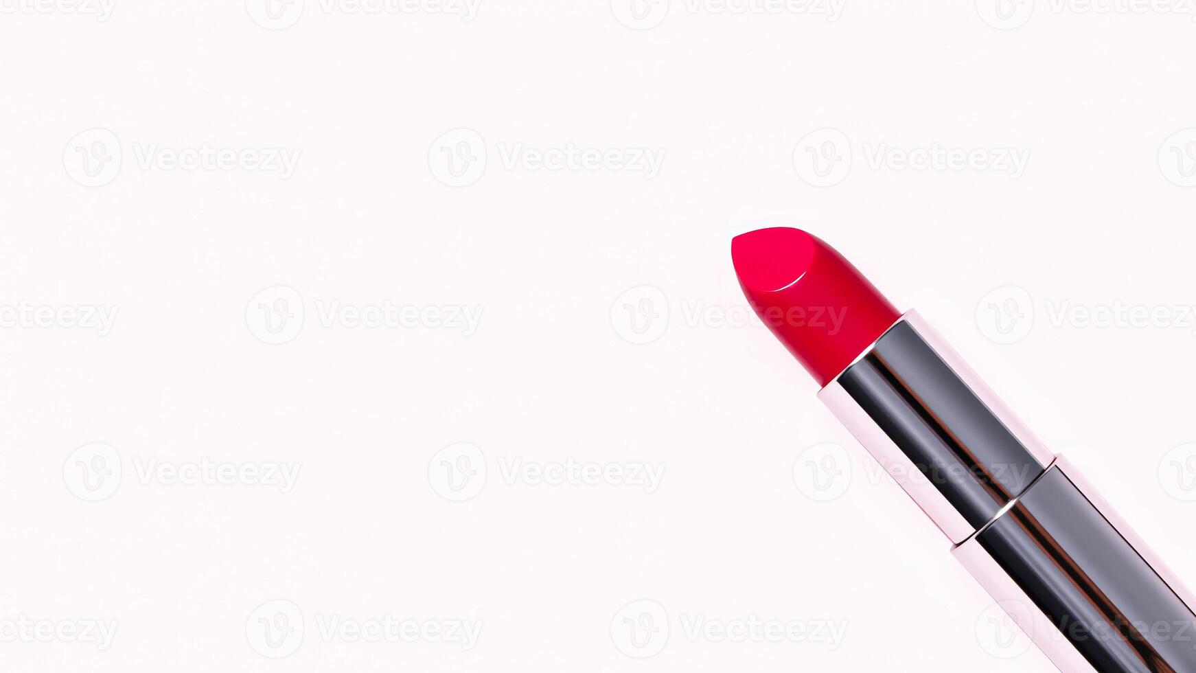 single bright red lipstick rests on a stark white background. photo