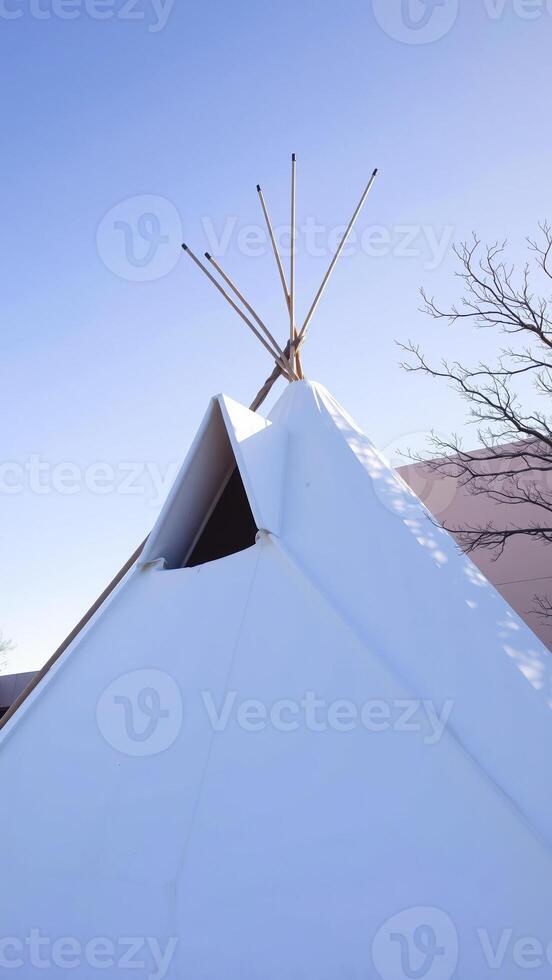 white tent under a blue sky photo