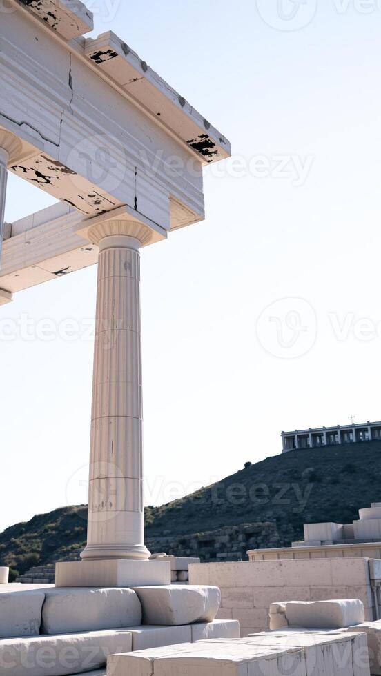 close- a white fluted column on an ancient structure photo
