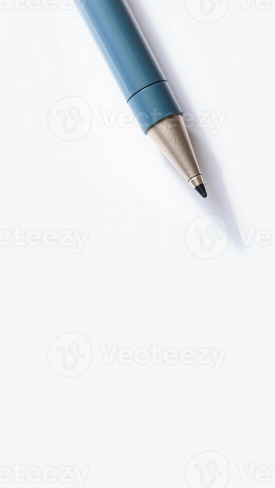 blue pen on a white surface photo