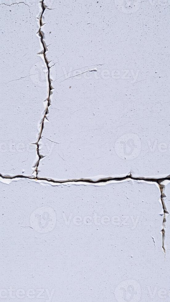 cracked white surface with dotted texture photo