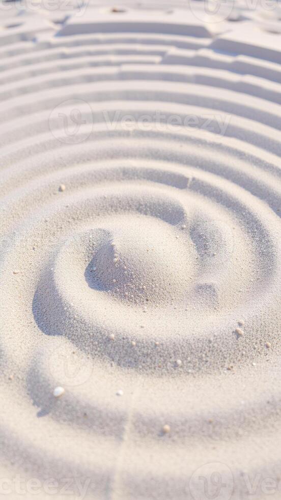 circular ripple on a sandy beach photo