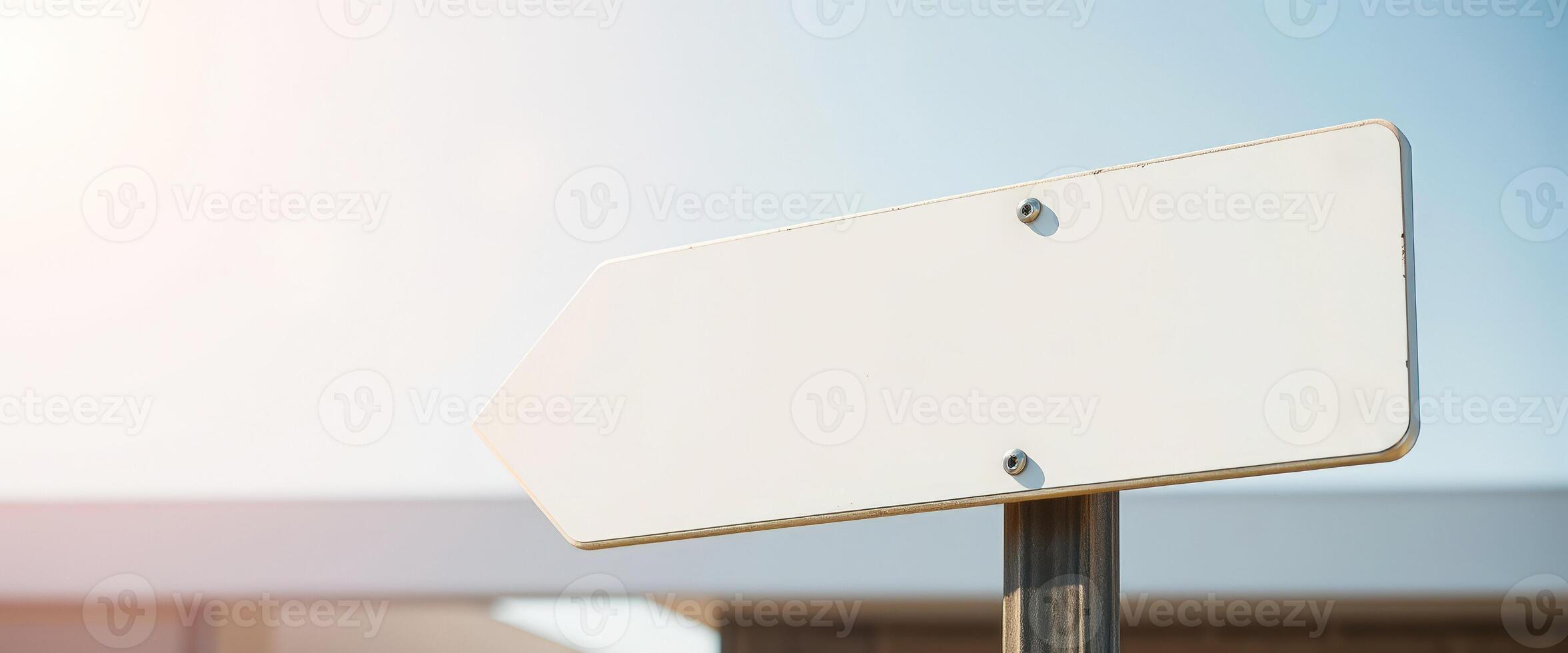 blank white arrow sign mounted on a metal post photo