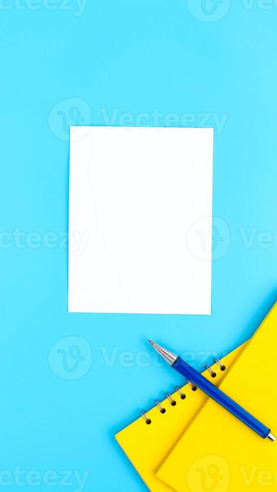 white piece paper on a blue background photo