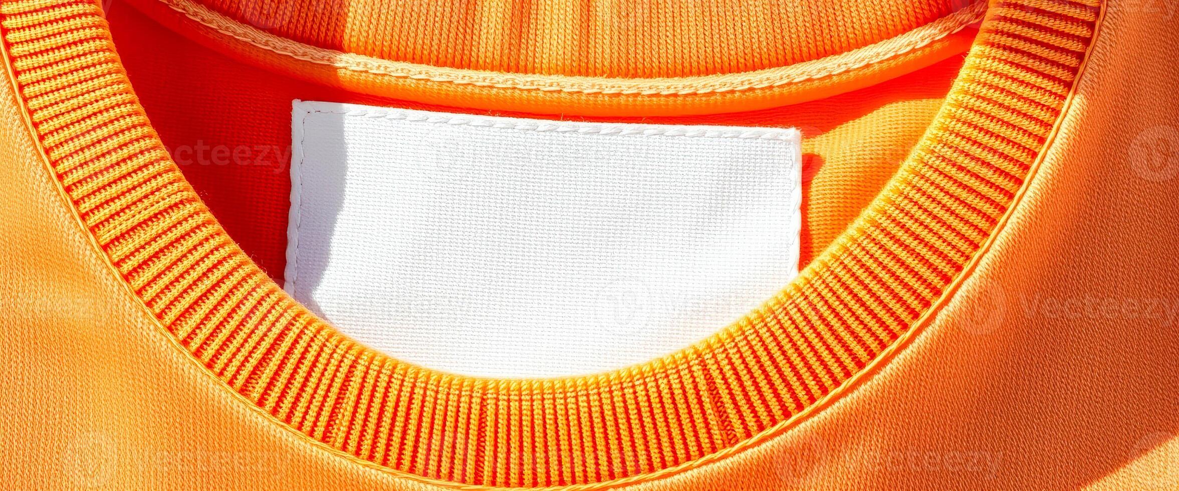 blank white label sewn on an garment photo