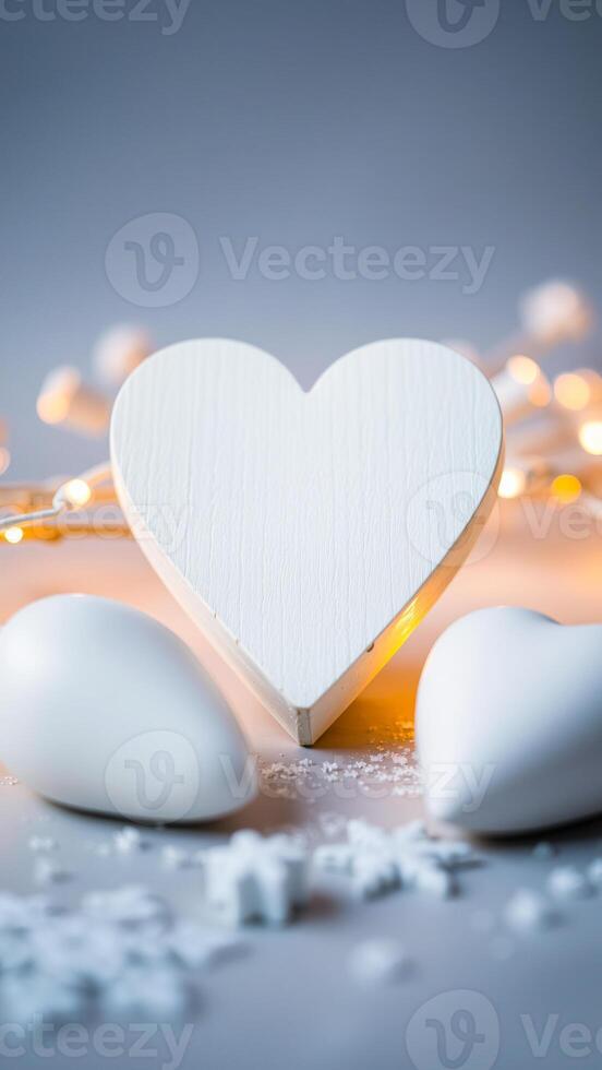 three white hearts with festive lights photo