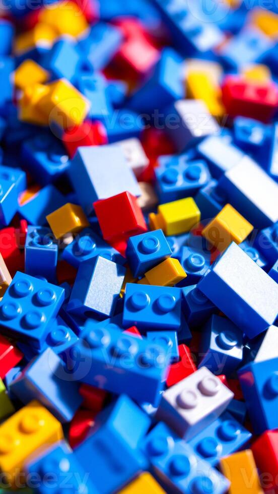 colorful heap plastic building blocks photo