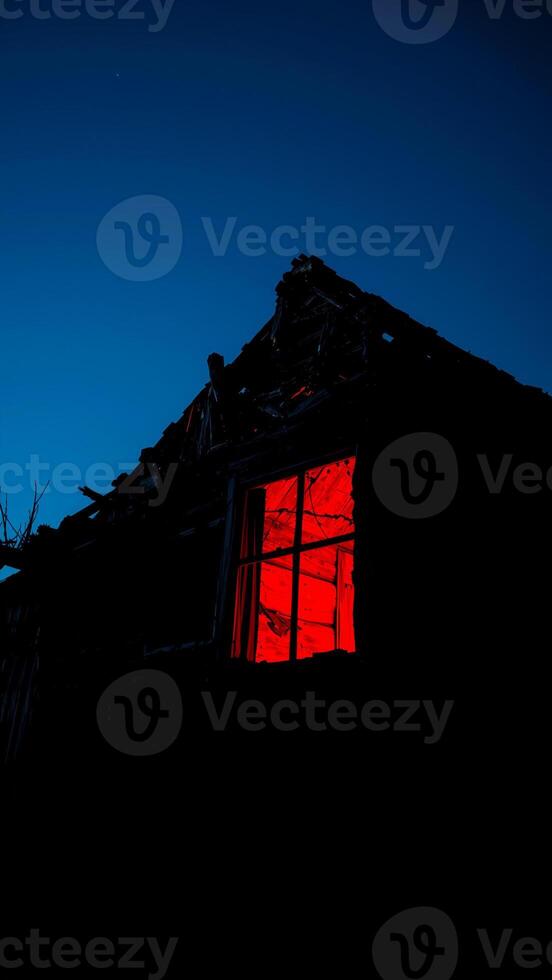 glowing window a weathered structure photo