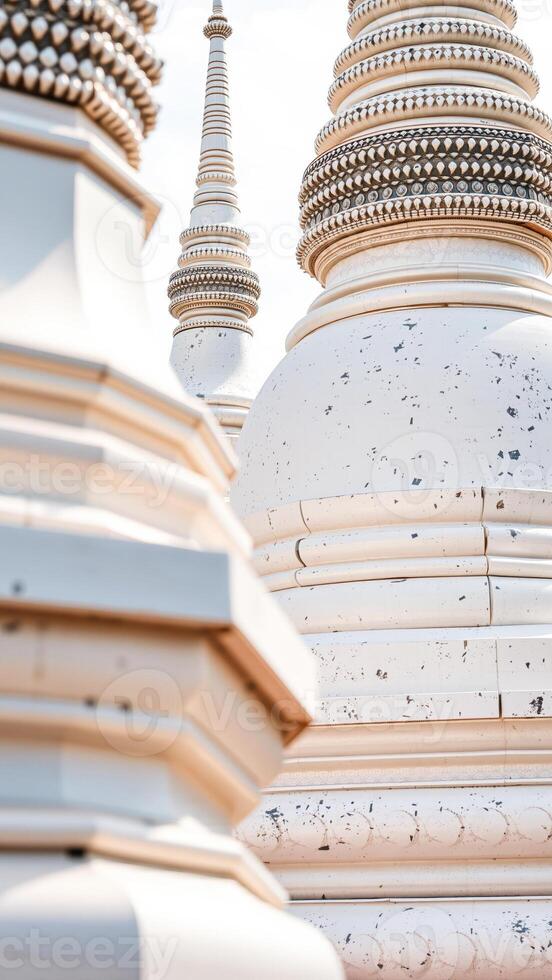 three ornate white domes reach towards the sky photo