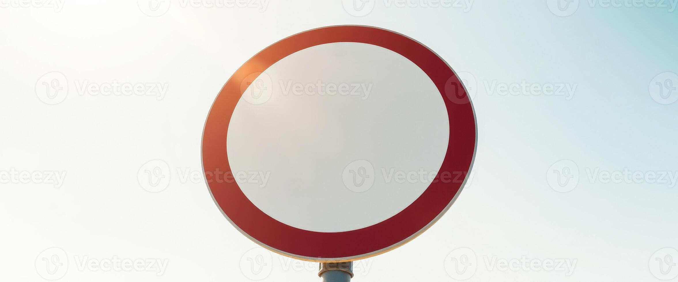 blank round traffic sign with a red border photo